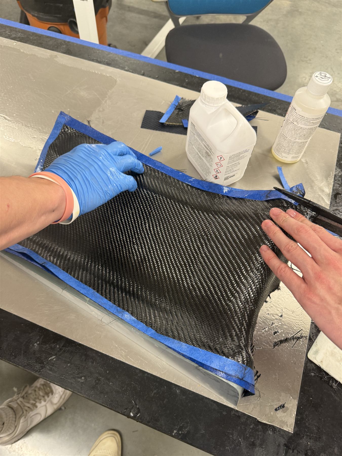 Trimming a cured carbon-fiber panel edge
